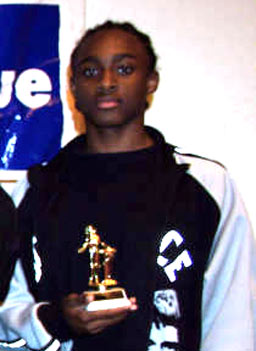 
                    Jermol with trophy.
                                            (Baltimore Urban Debate League)
                                        