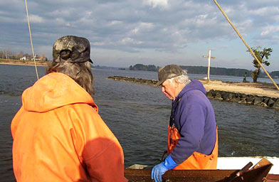 
                    Trossbach and Kevin, his assistant, with Church Point in the background.
                                            (Lawrence Lanahan)
                                        