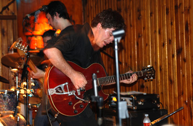 
                    Peter Case performing with his son, Joshua Case, at the Saxon Pub in Austin, Texas.
                                            (Rich Dean)
                                        