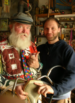 
                    Bobby Hansson with his friend Andrew Hayes.  Both are holding the "sascatuner," a musical instrument made out of a bicycle seat, two horns, plastic tubing and a trumpet mouthpiece.
                                            (Ann Heppermann)
                                        