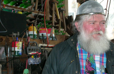 
                    Bobby with a strainer on his head.
                                            (Ann Heppermann)
                                        