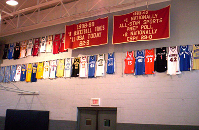 
                    The jerseys of famous Oak Hill Alumni hang in the Gym.
                                            (Lisa Smith)
                                        