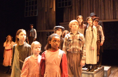 
                    Orphans waiting to be picked by local farm families.
                                            (History Theatre)
                                        