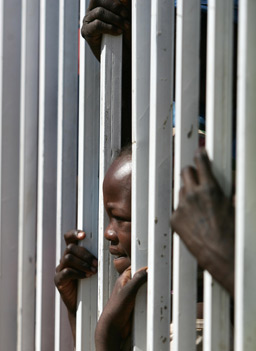 
                    Displaced Sudanese wait for a medical checkup in front of the Turkish Red Crescent Hospital in Darfur city of Nyala 21 February 2007.
                                            (Mustafa Ozer AFP/Getty)
                                        