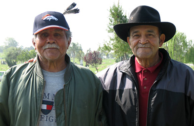 
                    Tony and Benny Vasquez. The brothers come to Resurrection cemetery in Montebello, Calif., every day, rain or shine, to visit their mother, Angela Vasquez, who is buried there. Angela Vasquez died in May 2004.
                                            (Suzie Lechtenberg)
                                        