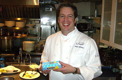 
                    Jason Wilson holding the items that he gamely attempted to cook with, to very mixed results.
                                            (John Moe)
                                        