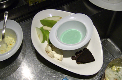 
                    Blue and yellow peeps melted together to form green goo, apples, pears, soft cheese, and chocolate for dipping.
                                            (John Moe)
                                        