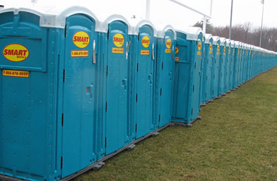 
                    If there's one thing you can count on seeing (and smelling) in Hopkinton on race day, it's the ubiquitous Porta-Potty. Despite the legions of toilets, sanitation is a concern with over 20,000 runners. It's not uncommon for residents to find racers taking pitstops on their front lawns.
                                            (Ian Gray)
                                        