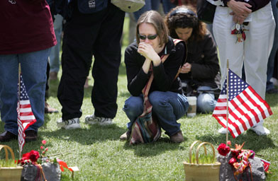 
                    A woman cries during the moment of silence for the victims of the April 16 massacre at Virginia Tech in Blacksburg, Va.
                                            (Tim Sloan / AFP / Getty Images)
                                        