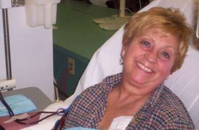 
                    Jean Del Muto always manages to be positive. Here she's smiling while going through a dialysis treatment.
                                            (Bradd Del Muto)
                                        