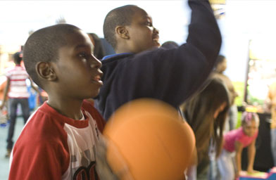 
                    Lucas Simon and Zye Joseph, both 11 years old, play basketball at Empire when they're not roller skating.
                                            (Sharon Kendrick)
                                        