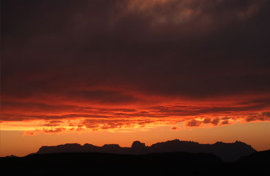 
                    The sun sets in Boquillas.
                                            (Michael May)
                                        