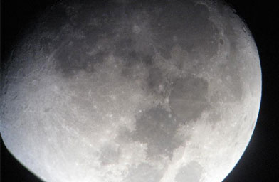 
                    The moon, through a twelve inch Dobsonian telescope.
                                            (Jane Houston Jones)
                                        