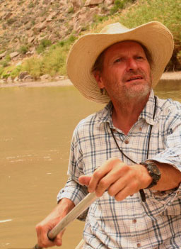 
                    Butch Hancock steers the canoe through the Rio Grande.
                                            (Michael May)
                                        
