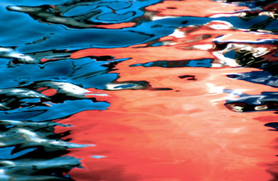 
                    "Red Buoy" This is a reflection of one of the many red buoys floating around the docks in Martha's Vineyard.  Smilack says she hears sirens when she sees this image.
                                            (Marcia Smilack)
                                        