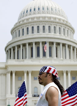 
                    Milton Perdomo waits for an immigration rally to start outside the U.S. Capitol on June 2, 2007. Organized by the National Capital Immigrant Coalition, immigration activists rallied before the Senate returned from their recess.
                                            (Brendan Smialowski / Getty Images)
                                        