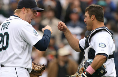 
                    Closing pitcher J.J. Putz (lert) and catcher Jamie Burke of the Seattle Mariners celebrate after defeating the New York Yankees 2-1 on May 13, 2007, at Safeco Field in Seattle, Wash.
                                            (Otto Greule Jr / Getty Images)
                                        