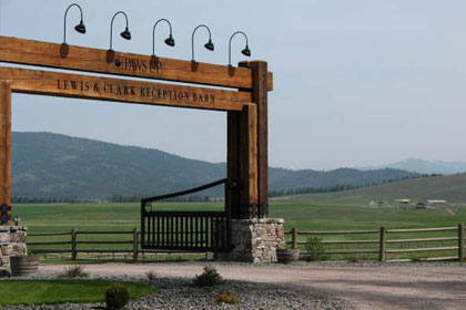 
                    The entrance to the Lewis &amp; Clark Reception Barn at the Resort at Paws Up, the swank location of Cowgirl University 2007. The resort sits on 37,000 acres east of Missoula, Mont., at least some of which is believed to have been traversed by Captain Merriwether Lewis on his trip back from the Pacific Ocean. Now it is traversed by "mountain buggies," i.e. golf carts.
                                            (Jule Gardner)
                                        