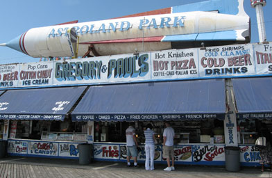 
                    On the boardwalk at Coney Island's Astroland Park. According to the Stan Fox, Gregory and Paul's has the best "everything."
                                            (Jesse Shapins)
                                        