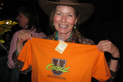 
                    Diana Parten, who lives on a ranch in Nevada and met her husband at a dulcimer convention (!), considers laying down some sweet scratch for Cowgirl U. merchandise.
                                            (Jule Gardner)
                                        