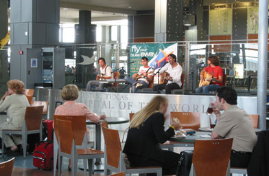 
                    Live music is a regular feature in the main terminal at the Austin airport. Local band Damesviolet takes to the stage.
                                        