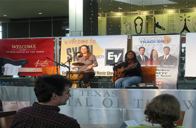 
                    Local Austin artists Ruthie Foster and Cyd Cassone sing the blues on the Austin airport stage.
                                        