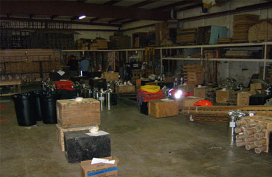 
                    Warehouse floors act as a staging area to load trucks with everything they need for 4th of July fireworks. Some of the dozen or so employees worked up to 70 consecutive days to help produce the show.
                                            (John Moe)
                                        