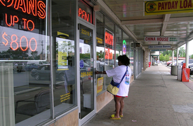 
                    Sandra King heads to the local payday lender.
                                            (Mhari Saito)
                                        