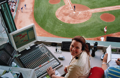 
                    Megan Kaiser sits at her control panel in the Fenway Park control room during games.
                                            (Gideon D'Arcangelo)
                                        