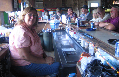 
                    Betty Deford is the founder of the Redneck Fishing Tournament. She is also the Manager of the Boat Tavern. Three years ago Deford was attacked by Asian carp and has been on a mission ever since.
                                            (Kelly McEvers)
                                        