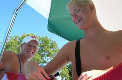 
                    David Tonnis (right), the lifeguard poet, works beside his friend and colleague Meg Kenny.
                                            (David Tonnis)
                                        