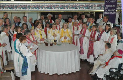 
                    Houk participates in an ordination ceremony on a boat in Pittsburgh, July 31, 2006.
                                            (Joan Houk)
                                        