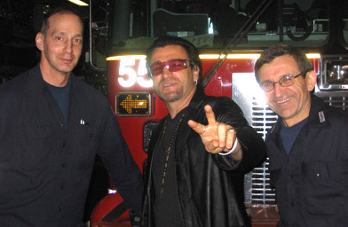 
                    "Bono" hangs with the fellows of Engine 55, in Chicago, Ill.
                                            (Roman Mars)
                                        