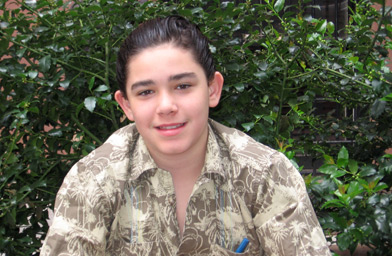 
                    Erez, the Bar Mitzvah boy, posing for the invitation photo.
                                            (Jesse Green)
                                        