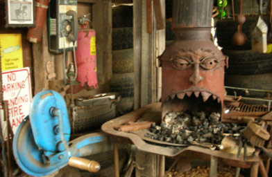 
                    This is where Bobby fires the coals for his blacksmithing work.  He built it himself.
                                            (Ann Heppermann)
                                        