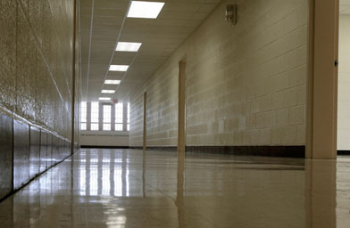 
                    At Virginia Tech, new floors, new ceilings and a fresh coat of paint cover the hallway on the second floor of Norris Hall ahead of the phased re-use of building June 14, 2007 in Blacksburg, Virginia. No classes will be held in Norris, but the 70,000-square-foot building will be used for offices and laboratories. The classrooms where the shootings happened will remain closed.
                                            (Chip Somodevilla / Getty Images)
                                        