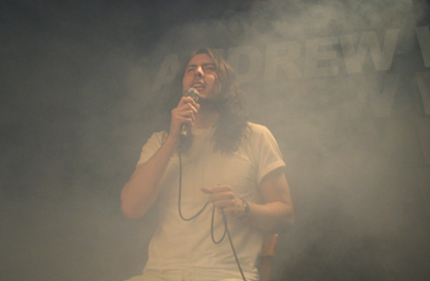 
                    Andrew WK takes the stage at the People's Improv Theater in New York amidst a haze of smoke.
                                            (Amber Santos)
                                        