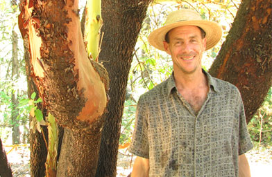 
                    Richard Perrelli poses under a madrone tree.
                                            (Saving The Sierra 2007)
                                        