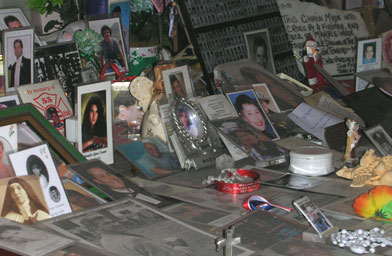 
                    Photographs and cards from the 9/11 memorial altar line the periphery of the church.
                                            (Ann Heppermann)
                                        