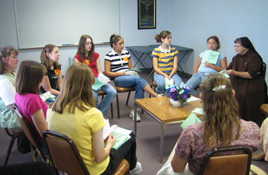 
                    Sister Andrea leading a study group.
                                            (Kelly McEvers)
                                        