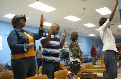 
                    Congregants in worship at Church N the Mall in North Randall, Ohio.
                                            (Mhari Saito)
                                        