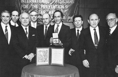 
                    IPPNW founders in Oslo are (left to right) Drs. Mikhail Kuzin, James Muller, Leonid Ilyin, Eric Chivian, Evgueni Chazov, Bernard Lown and Herbert Abrams. Also pictured are Dr. John Pastore and Dr. Nikolai Bochkov fourth and fifth from the left.
                                            (International Physicians for Prevention of Nuclear War)
                                        