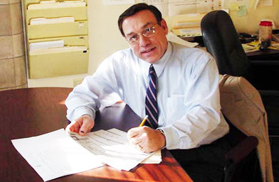 
                    John Cena, at his desk as city assessor.
                                            (Courtesy of the city of Methuen, Mass.)
                                        