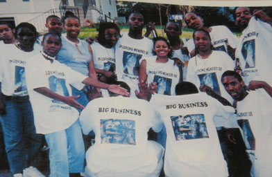 
                    A group of friends wearing memorial t-shirts.
                                            (Maria Carter)
                                        