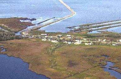 
                    The precarious, narrow road to Isle de Jean Charles, on the southern tip of Louisiana.
                                            (Eve Troeh/CourtestyTimes-Picayune)
                                        