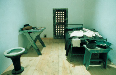 
                    When Eastern State Penitentiary opened in 1829, in was the model for prison reform.  Each inmate would spend his sentence in a large, vaulted sky-lit cell complete with central heat and a flush toilet. This cell was restored to its 1830s appearance in 2001.
                                            (Tom Berault, 2001)
                                        