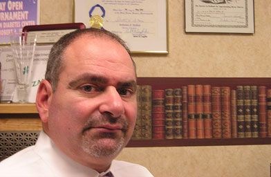 
                    Peter Zahka, President of the society from December 2006 to December 2007. His certificate of membership is in the upper right.
                                            (Sean Cole)
                                        