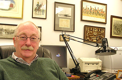 
                    Robert Hanson, Clerk/Treasurer of The Society in Dedham for Apprehending Horse Thieves. His office walls display what he calls his "cavalry fetish."
                                            (Sean Cole)
                                        