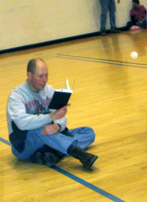 
                    Smart caucus goers bring something to keep occupied during the down time.
                                            (Kyle Gassiott)
                                        