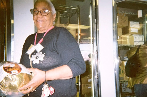 
                    Ann Shotwell of Morningstar Baptist Church picks out a frozen turkey at the Cleveland Food Bank.
                                            (Kaiah Callahan)
                                        